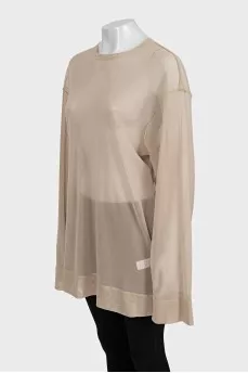 Long, loose-fitting blouse