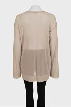 Long, loose-fitting blouse