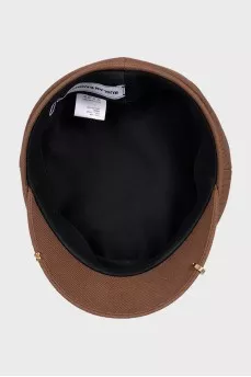 Brown cap with gold decoration