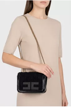 Black bag with a textile logo