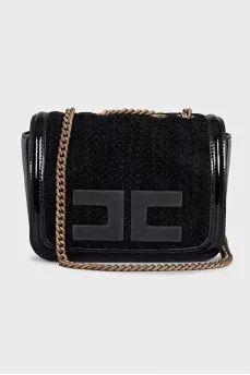 Black bag with a textile logo