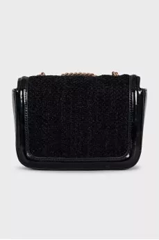 Black bag with a textile logo