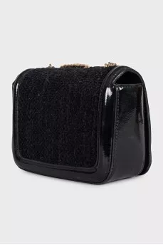 Black bag with a textile logo