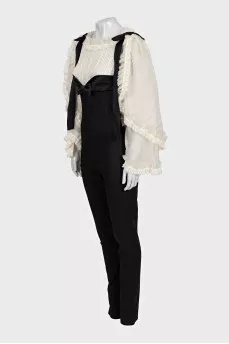 Black jumpsuit with white silk top