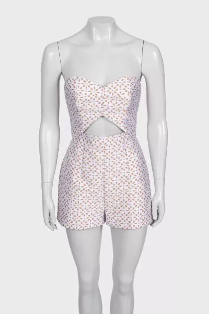 White jumpsuit with printed shorts