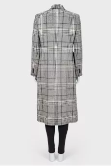 Woolen coat in a cage