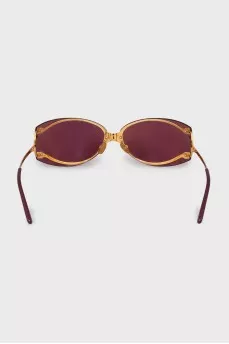 Burgundy sunglasses with gold frames