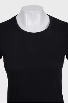 Black T-shirt with a patch on the sleeve