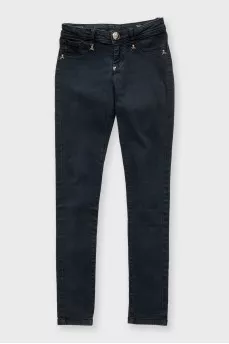 Black skinny jeans with signature gold trim