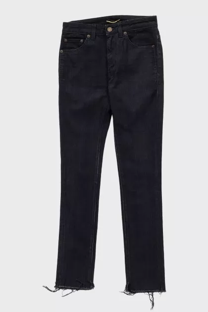 Black skinny jeans with raw hem