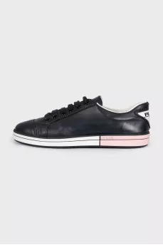 Leather sneakers with a logo on the heel