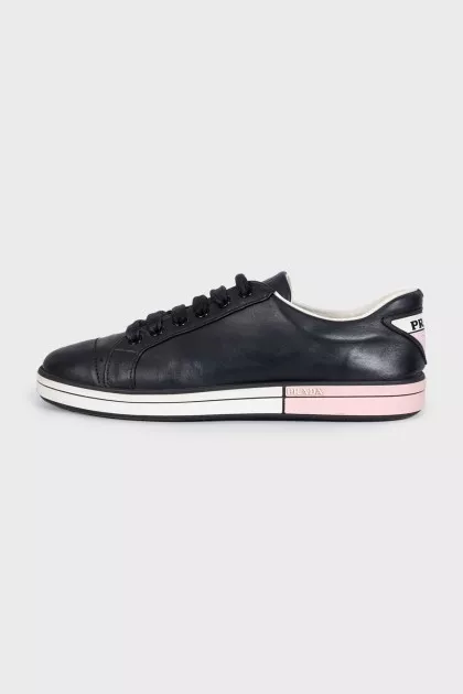 Leather sneakers with a logo on the heel