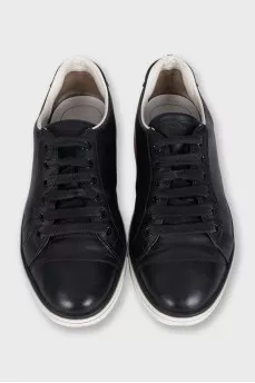 Leather sneakers with a logo on the heel
