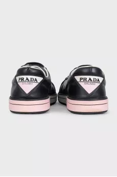 Leather sneakers with a logo on the heel