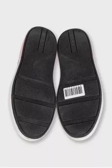 Leather sneakers with a logo on the heel