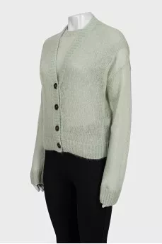 Green set with a cardigan with a tag