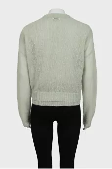 Green set with a cardigan with a tag