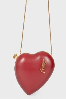 A handbag in the form of a red heart