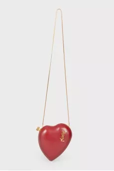 A handbag in the form of a red heart