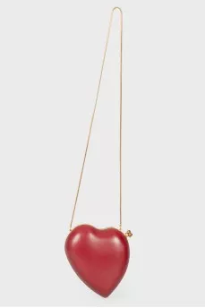 A handbag in the form of a red heart