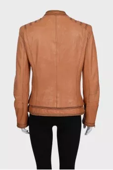 Brown leather jacket with asymmetrical zipper