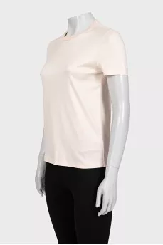 Light pink T-shirt with embroidered logo