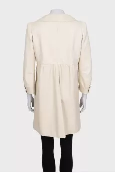 Beige leather coat with accent shoulders