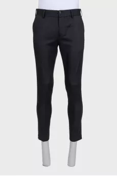 Men's black straight-leg trousers with creases