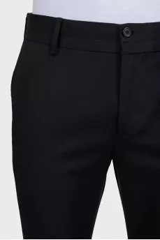 Men's black straight-leg trousers with creases