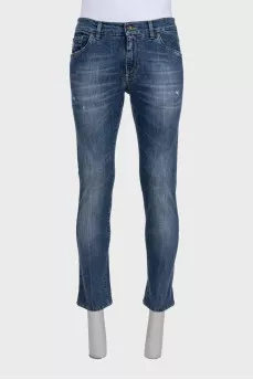 Men's blue jeans with a distressed effect