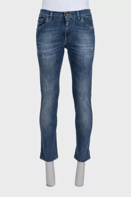 Men's blue jeans with a distressed effect
