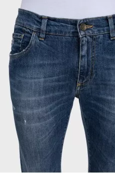 Men's blue jeans with a distressed effect