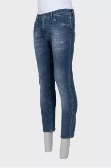 Men's blue jeans with a distressed effect