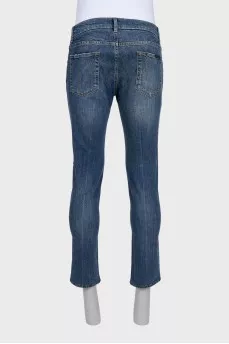 Men's blue jeans with a distressed effect