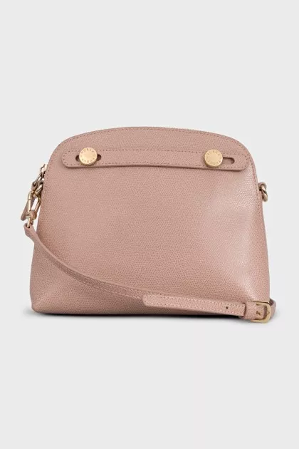 Pink leather bag with gold buttons