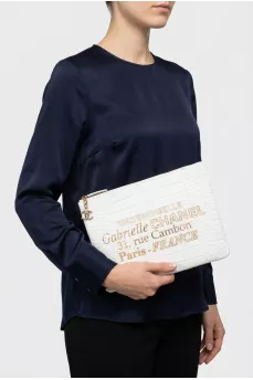 White leather clutch with embossing