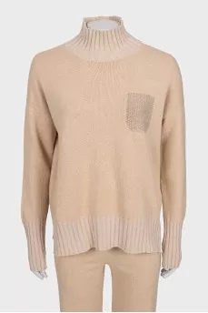 Beige straight-cut suit consisting of a sweater and trousers