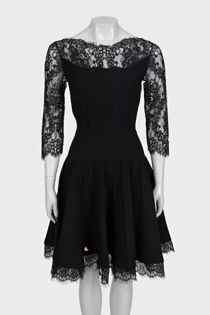 Black fitted dress decorated with lace