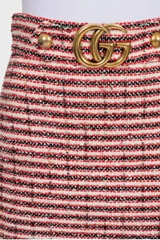 Midi skirt decorated with a gold logo