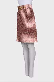 Midi skirt decorated with a gold logo