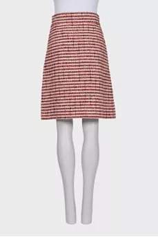 Midi skirt decorated with a gold logo