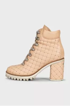 Beige quilted ankle boots with heels