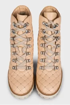 Beige quilted ankle boots with heels
