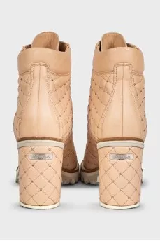 Beige quilted ankle boots with heels