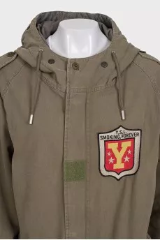 Green parka with a patch