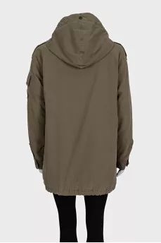 Green parka with a patch