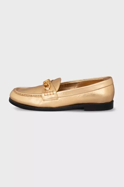 Gold leather loafers