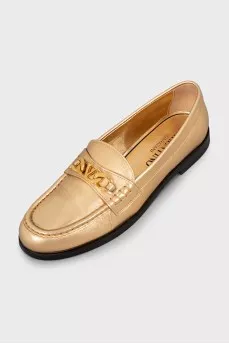 Gold leather loafers