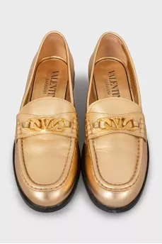 Gold leather loafers
