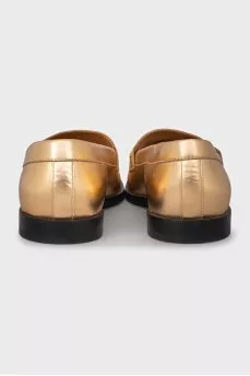 Gold leather loafers